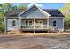 Charming single-story home with a covered porch and gray siding at 524 Waco Rd, Kings Mountain, NC 28086