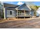 Cozy single-story home featuring gray siding and a covered front porch at 524 Waco Rd, Kings Mountain, NC 28086