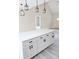 Kitchen island and cabinets with pendant lights and gray wood floors at 524 Waco Rd, Kings Mountain, NC 28086