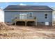 Rear exterior of the house with deck, and access to the backyard at 524 Waco Rd, Kings Mountain, NC 28086