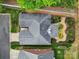 Aerial view of a well maintained property with great landscaping and dark grey roof at 5404 Dunedin Ln, Charlotte, NC 28270