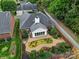 Stunning aerial view of home's back exterior, sunroom and decorative landscaping at 5404 Dunedin Ln, Charlotte, NC 28270
