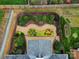 Aerial shot of backyard with decorative gravel path and amazing flower garden at 5404 Dunedin Ln, Charlotte, NC 28270