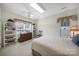 Comfortable bedroom with a ceiling fan, natural light, and classic decor at 5404 Dunedin Ln, Charlotte, NC 28270