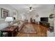 Spacious living room with hardwood floors, neutral walls, and ample natural light at 5404 Dunedin Ln, Charlotte, NC 28270