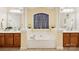 Elegant bathroom with soaking tub, separate vanities, and neutral colors at 551 Hemmings Nw Pl, Concord, NC 28027