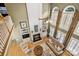 Open-concept living room with soaring ceilings, large windows, a cozy fireplace, and inviting decor at 551 Hemmings Nw Pl, Concord, NC 28027