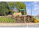 Street view of Laurel Park community entrance with well-maintained landscaping and signage at 551 Hemmings Nw Pl, Concord, NC 28027