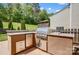 Backyard featuring a built-in grill and fridge at 5628 Selkirkshire Rd, Charlotte, NC 28278