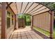 Backyard featuring a covered patio area with sun shades at 5628 Selkirkshire Rd, Charlotte, NC 28278