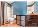 A compact bathroom featuring a shower-tub combo and vanity at 5628 Selkirkshire Rd, Charlotte, NC 28278