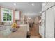 Spacious kitchen with granite countertops, white cabinetry and stainless steel refrigerator at 6017 Summerston Pl, Charlotte, NC 28277