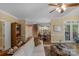 Bright living room showing hardwood floors, a white sofa, and an open floor plan at 6017 Summerston Pl, Charlotte, NC 28277