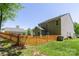 Fenced backyard with green grass, showcasing a private outdoor space for relaxation and activities at 602 Black Maple Dr, Kannapolis, NC 28081