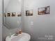 Modern bathroom featuring a sleek sink, vanity, framed mirror and neutral wall color at 602 Black Maple Dr, Kannapolis, NC 28081