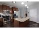 This kitchen features granite countertops and stainless steel appliances at 602 Black Maple Dr, Kannapolis, NC 28081