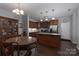 The kitchen features granite countertops, stainless steel appliances, and a breakfast nook at 602 Black Maple Dr, Kannapolis, NC 28081