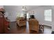 The living room has hardwood floors and natural light at 602 Black Maple Dr, Kannapolis, NC 28081