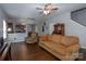 Spacious living room with hardwood floors and open layout to the kitchen at 602 Black Maple Dr, Kannapolis, NC 28081