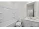 This modern bathroom features a shower and tub combination and a vanity with a sink at 655 District Ct, Fort Mill, SC 29708