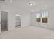 Spacious bedroom with closet and ensuite bath access at 655 District Ct, Fort Mill, SC 29708
