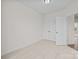 A bedroom with neutral carpeting and a double closet at 655 District Ct, Fort Mill, SC 29708