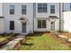 This new home features manicured landscaping and modern architecture at 655 District Ct, Fort Mill, SC 29708