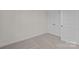 Neutral carpeted bedroom with a double door closet at 657 District Ct, Fort Mill, SC 29708