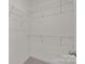 Walk-in closet with wire shelving and neutral carpet at 657 District Ct, Fort Mill, SC 29708