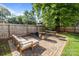 Outdoor brick patio featuring a full outdoor living setup with grill at 700 Oakland Ave, Charlotte, NC 28204