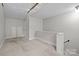 Bedroom with vaulted ceilings, carpet flooring, and closet at 700 Oakland Ave, Charlotte, NC 28204