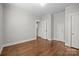 Neutral bedroom with hardwood floors and multiple closets at 700 Oakland Ave, Charlotte, NC 28204