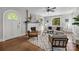 Bright living room with hardwood floors, neutral walls, fireplace, large windows, and modern decor at 700 Oakland Ave, Charlotte, NC 28204
