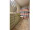 Bathroom featuring a toilet, bath with shower, and a vanity with plenty of storage and neutral color palette at 788 N Main St, Mount Pleasant, NC 28124