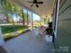 Covered front porch showcasing a rocking chair, ideal for enjoying outdoor relaxation and neighborhood views at 788 N Main St, Mount Pleasant, NC 28124