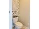 Stylish powder room with unique wallpaper, clean fixtures, and a fresh, modern aesthetic at 788 N Main St, Mount Pleasant, NC 28124