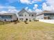 Expansive backyard showcasing a lush lawn and well-maintained landscaping, offering ample space for recreation at 79411 Ridgehaven Rd, Indian Land, SC 29720