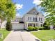 Inviting two-story home with a well-kept lawn, a two-car garage, and an attractive facade at 79411 Ridgehaven Rd, Indian Land, SC 29720