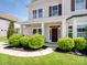 Charming covered front porch with beautiful landscaping and well maintained lawn at 79411 Ridgehaven Rd, Indian Land, SC 29720