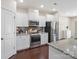 Modern kitchen with stainless steel appliances and granite countertops at 79411 Ridgehaven Rd, Indian Land, SC 29720