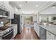 Spacious kitchen with stainless steel appliances and access to the dining area at 79411 Ridgehaven Rd, Indian Land, SC 29720