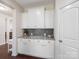 Convenient pantry area with white cabinets and granite countertop at 79411 Ridgehaven Rd, Indian Land, SC 29720