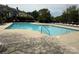 Large community pool with shallow entrance and lounge seating at 9305 Four Mile Creek Rd, Charlotte, NC 28277