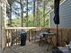 Private deck with seating and beautiful tree view at 9305 Four Mile Creek Rd, Charlotte, NC 28277