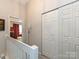 Hallway with closet and view to bedroom at 9305 Four Mile Creek Rd, Charlotte, NC 28277