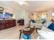 Spacious living room with modern decor, fireplace, and access to the upstairs area at 9305 Four Mile Creek Rd, Charlotte, NC 28277