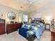 Spacious main bedroom with carpet, ceiling fan, and a large window at 9305 Four Mile Creek Rd, Charlotte, NC 28277