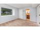 Bedroom featuring a window and access to the ensuite bathroom at 10967 Harrowfield Rd, Charlotte, NC 28226