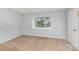 Spacious bedroom featuring a window to let in natural light at 10967 Harrowfield Rd, Charlotte, NC 28226