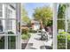 View of the manicured backyard from inside the home through an open patio door at 1103 Hillcrest Ridge Dr, Salisbury, NC 28146